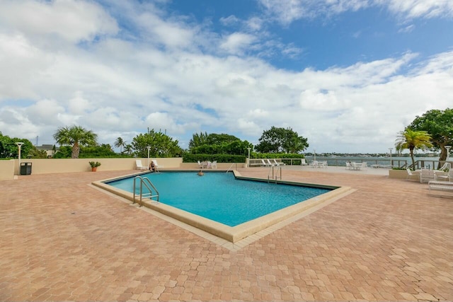 view of pool featuring a patio