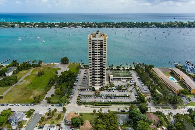 birds eye view of property featuring a water view