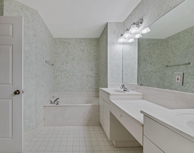 bathroom with vanity, tile patterned flooring, and a bathing tub