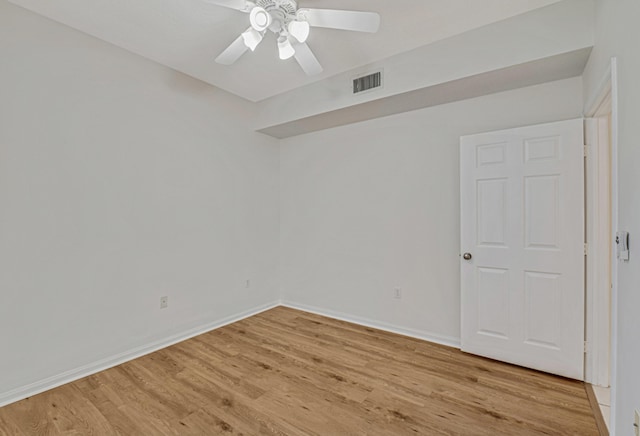 unfurnished room featuring light hardwood / wood-style flooring and ceiling fan