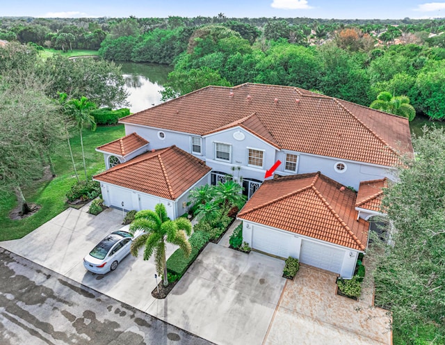 drone / aerial view with a water view