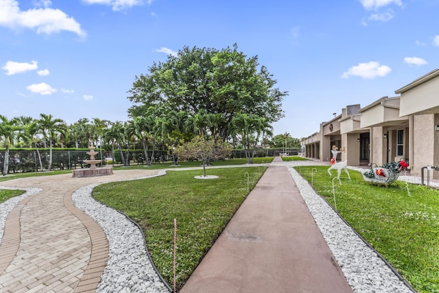 view of community with a lawn