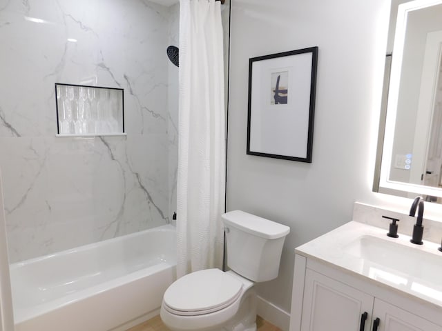 full bath with vanity, shower / bath combination with curtain, and toilet