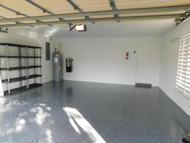 garage with electric panel, electric water heater, and a garage door opener