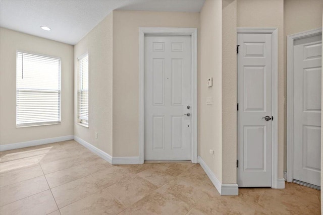 view of tiled foyer