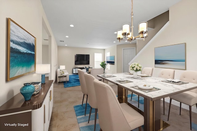 dining area with a notable chandelier