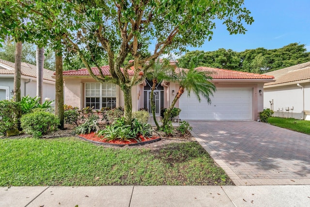 view of front of house with a garage