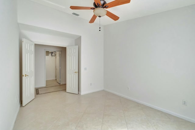 unfurnished bedroom featuring ceiling fan