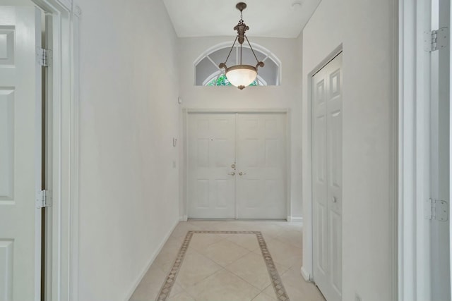 entryway featuring light tile patterned floors