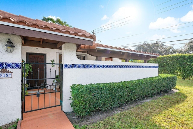 view of home's exterior featuring a yard