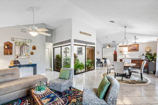 living room with a textured ceiling, ceiling fan with notable chandelier, and high vaulted ceiling