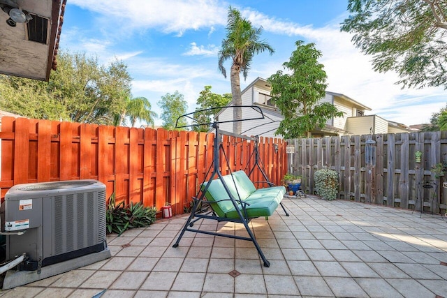 view of patio / terrace with central air condition unit