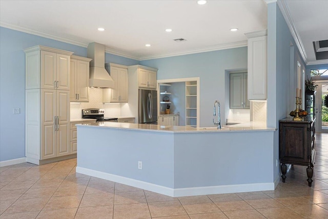 kitchen featuring wall chimney exhaust hood, crown molding, a kitchen breakfast bar, kitchen peninsula, and stainless steel appliances