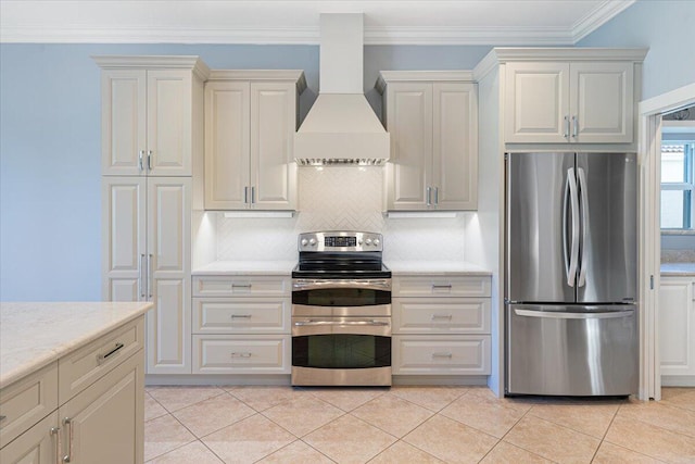 kitchen with light tile patterned flooring, tasteful backsplash, custom exhaust hood, stainless steel appliances, and crown molding