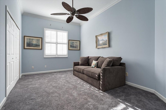 living room featuring crown molding, ceiling fan, and dark carpet