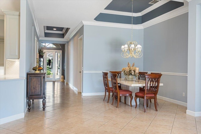 tiled dining room with a notable chandelier, ornamental molding, and a raised ceiling