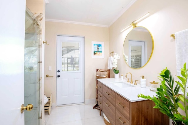 bathroom featuring tile patterned flooring, vanity, a shower with shower door, and crown molding