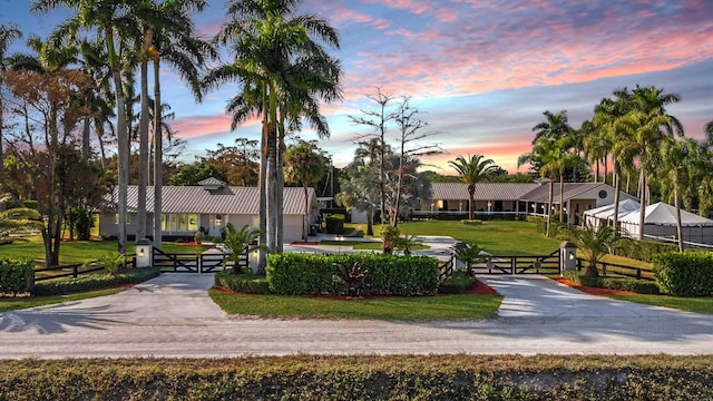 view of property's community with a lawn