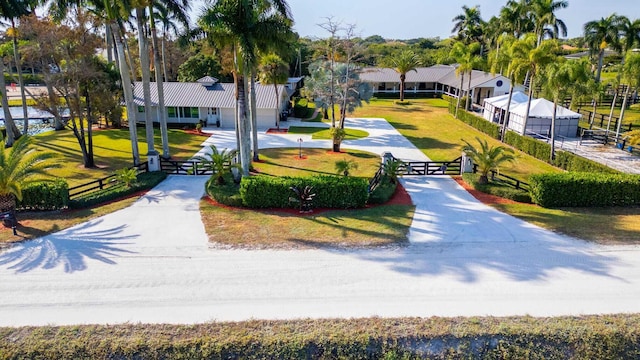 view of home's community featuring a yard