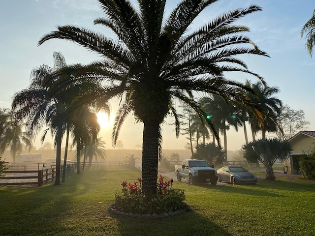 surrounding community featuring a yard