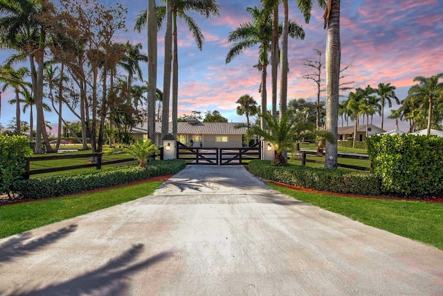 view of front of property with a yard