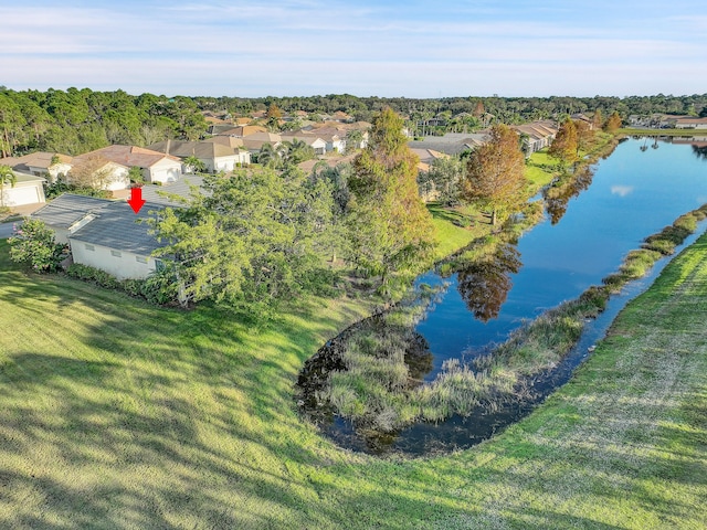 bird's eye view with a water view and a residential view