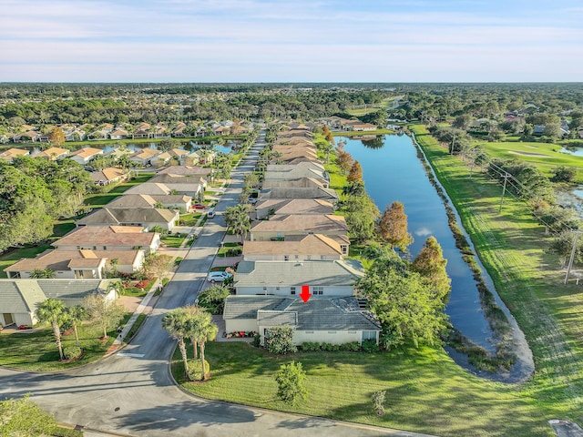 bird's eye view with a water view and a residential view