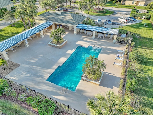 pool featuring a patio area and a fenced backyard