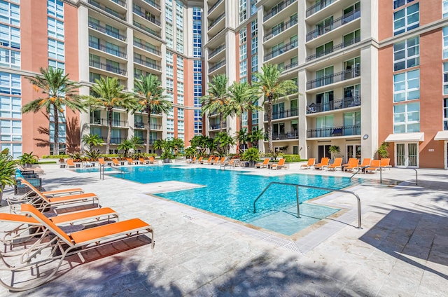 view of pool featuring a patio