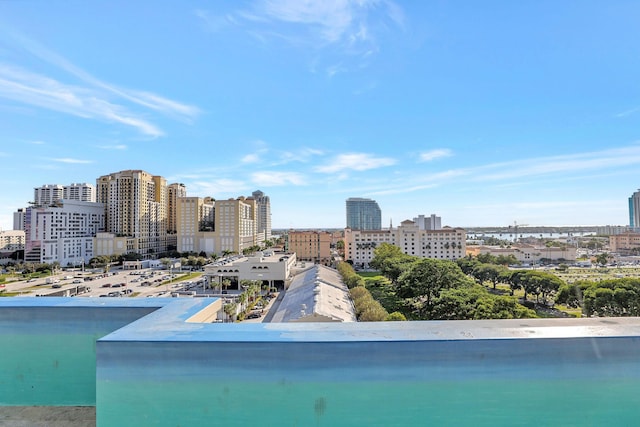 view of swimming pool with a water view