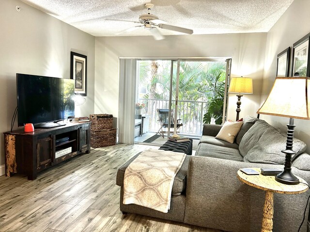 bedroom featuring light hardwood / wood-style flooring and a textured ceiling