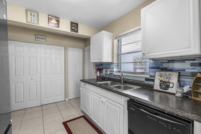 kitchen with tasteful backsplash, dishwasher, sink, and white cabinets