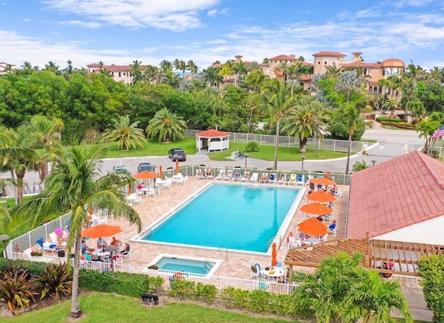 view of swimming pool with a patio area