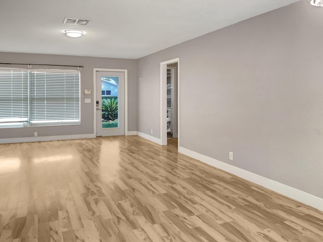 entryway with light hardwood / wood-style flooring