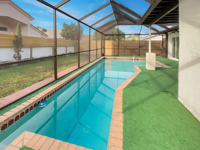 view of pool with a lanai