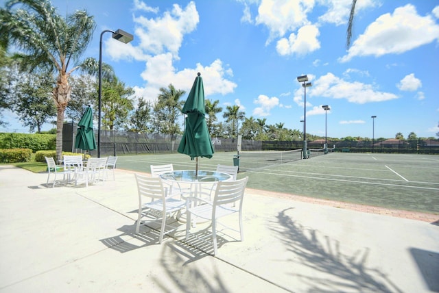 exterior space featuring tennis court