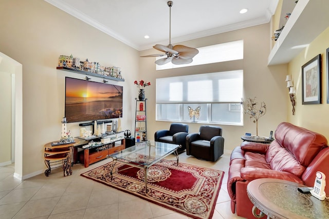 tiled living room featuring ceiling fan and ornamental molding