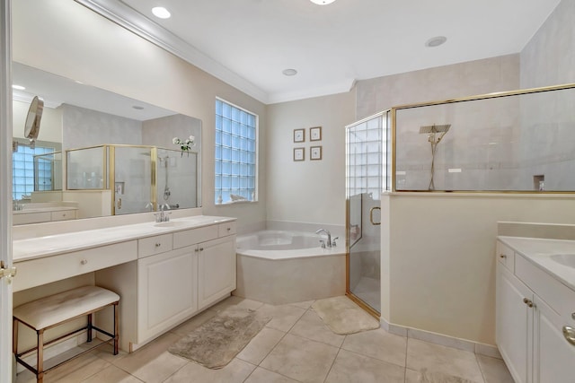 bathroom with tile patterned floors, vanity, and independent shower and bath