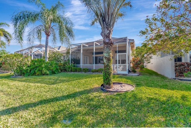 view of yard with a lanai