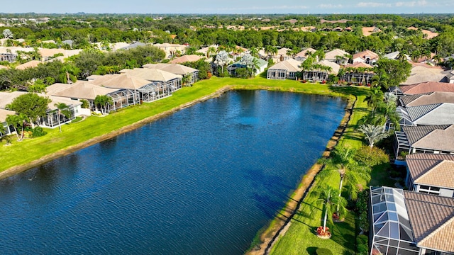 drone / aerial view with a water view