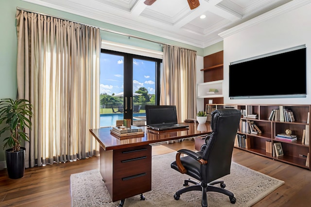 office featuring ceiling fan, coffered ceiling, beamed ceiling, ornamental molding, and hardwood / wood-style flooring