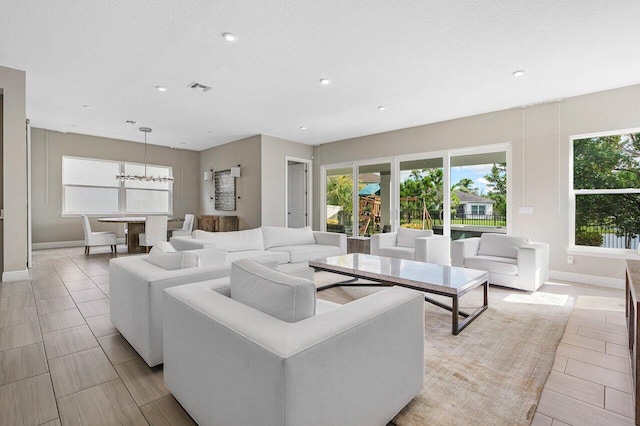 living room featuring a textured ceiling