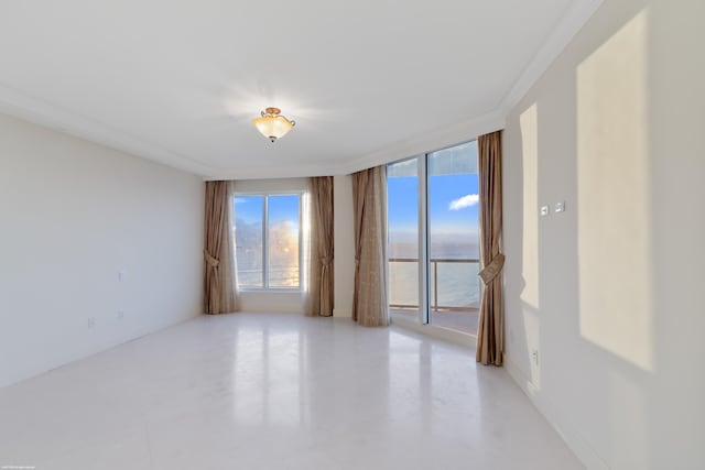 empty room with a water view and ornamental molding