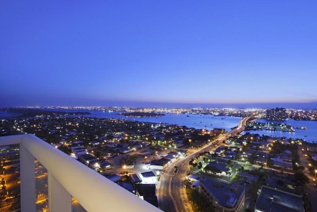 aerial view at dusk with a water view