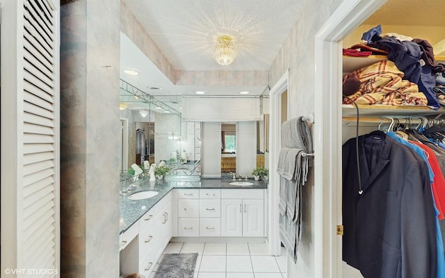 bathroom featuring vanity and tile patterned floors