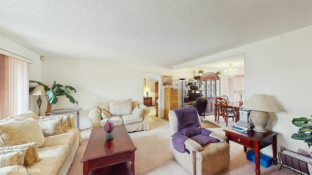 carpeted living room with a textured ceiling and a chandelier