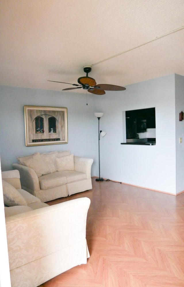 living room featuring parquet floors