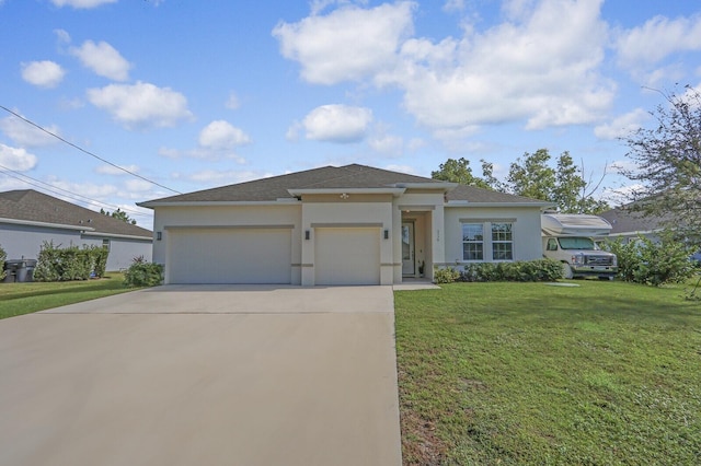 view of front of home with a garage and a front lawn