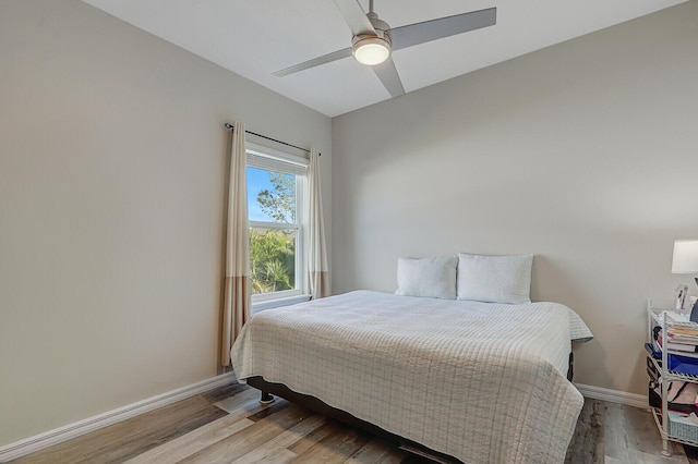 bedroom featuring ceiling fan and light wood-type flooring