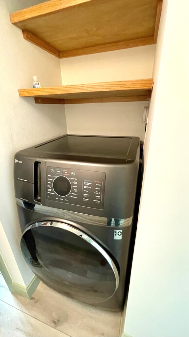 laundry room featuring washer / dryer